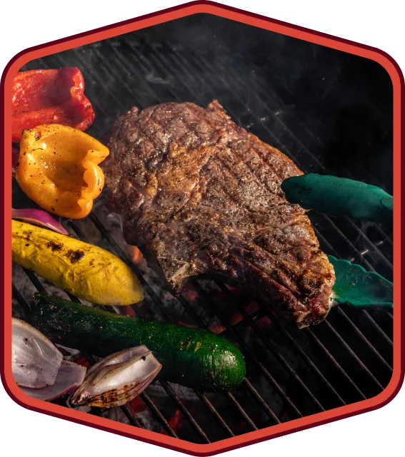 Bistec y vegetales a la parrilla