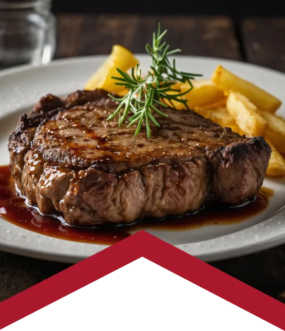 Bistec servido en plato con acompañamientos